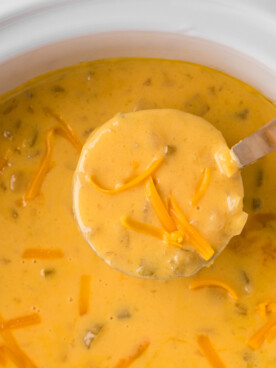 overhead shot of cooked potato cheese soup.