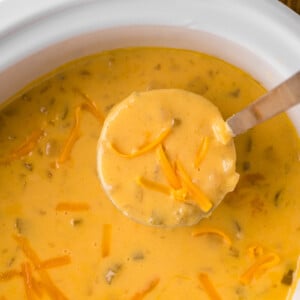 overhead shot of cooked potato cheese soup.