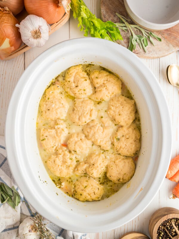 Cooked turkey and dumplings in a slow cooker.