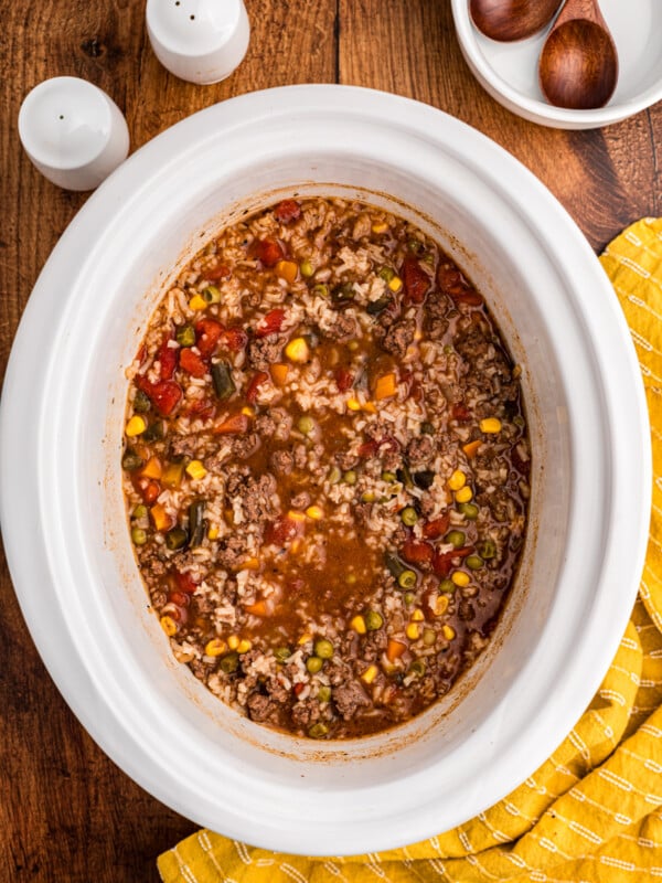busy day soup in a slow cooker with salt and pepper shakers on the side.