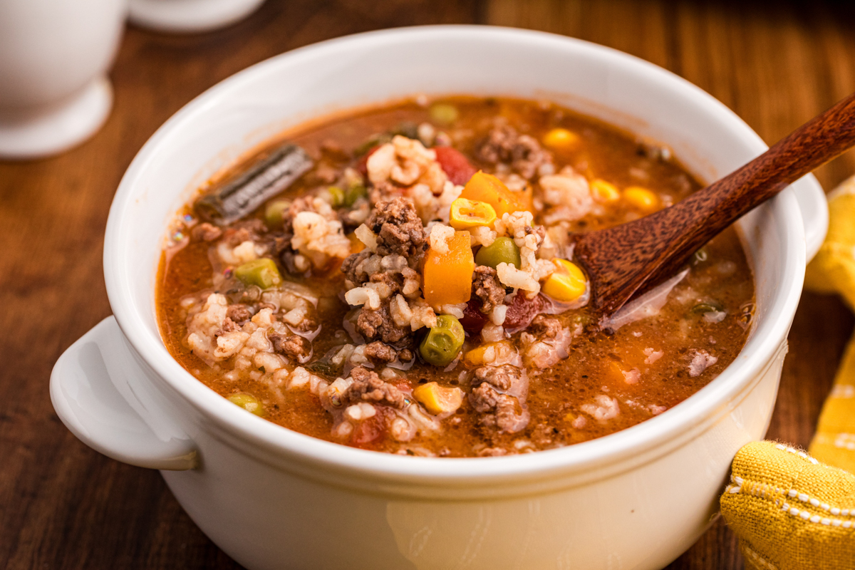 serving of slow cooker busy day soup in a white bowl.