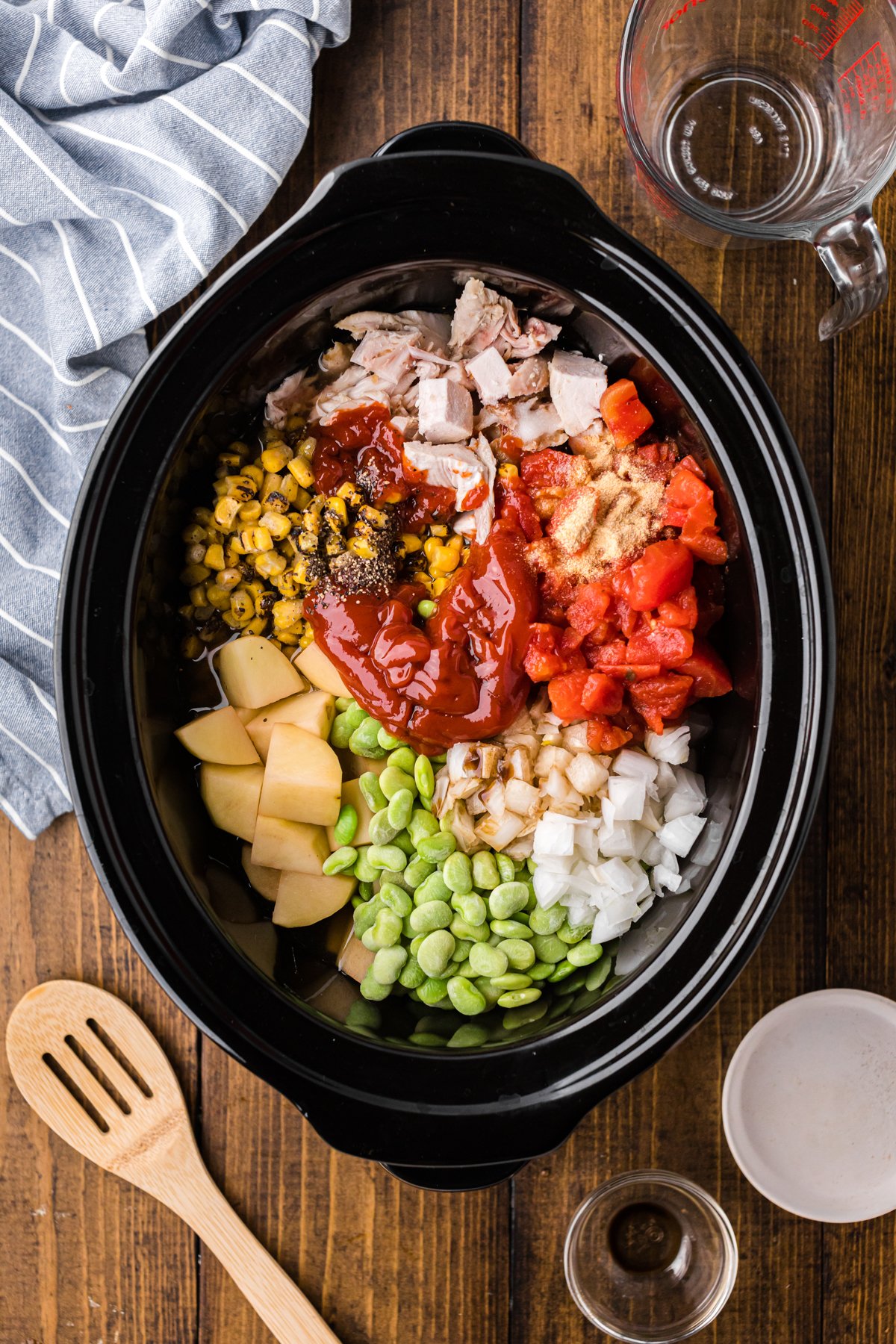 CAMP STEW ingredinets in a slow cooker.