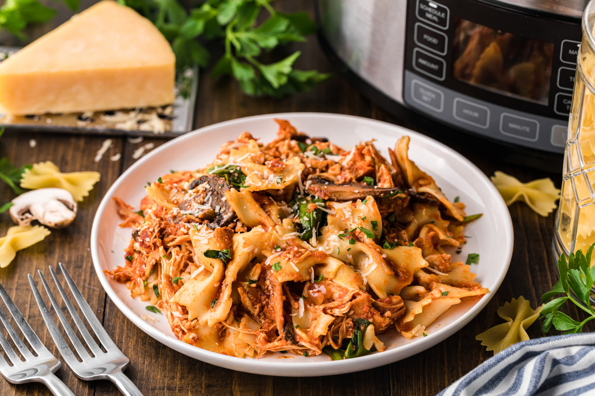 slow cooker chicken bacon pasta on a white plate.