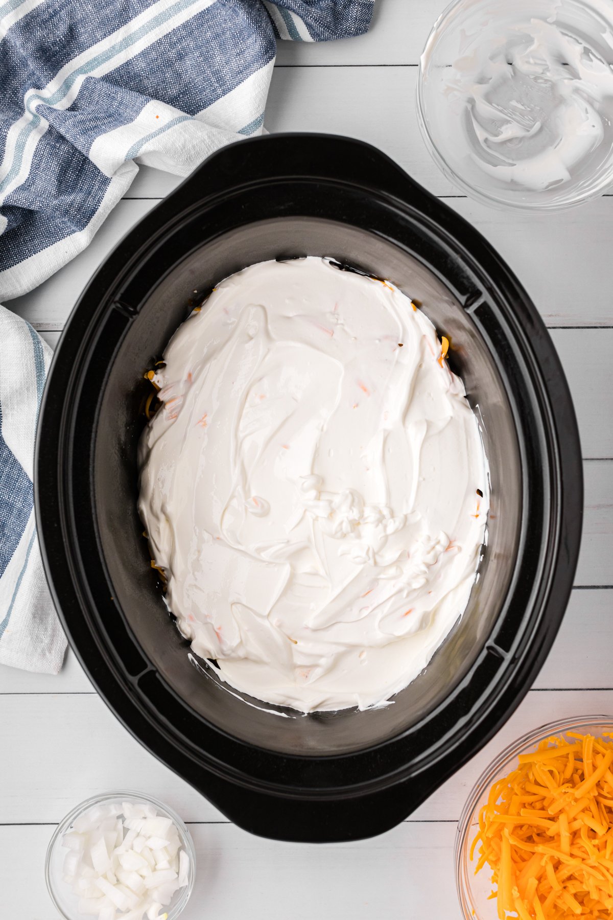 sour cream added on casserole.