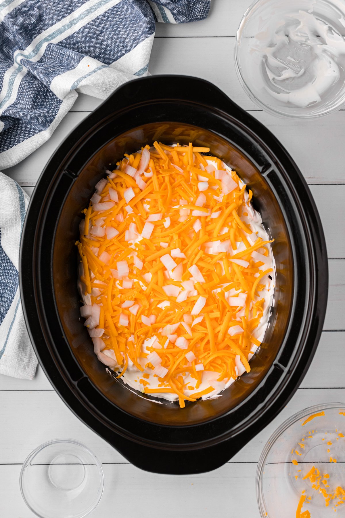 ready to cook, chili cheese casserole in a crockpot.