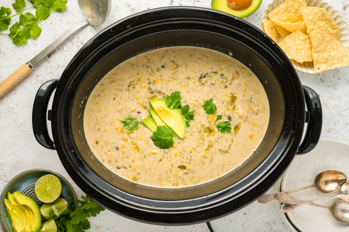 overhead of slow cooker green enchilada soup.