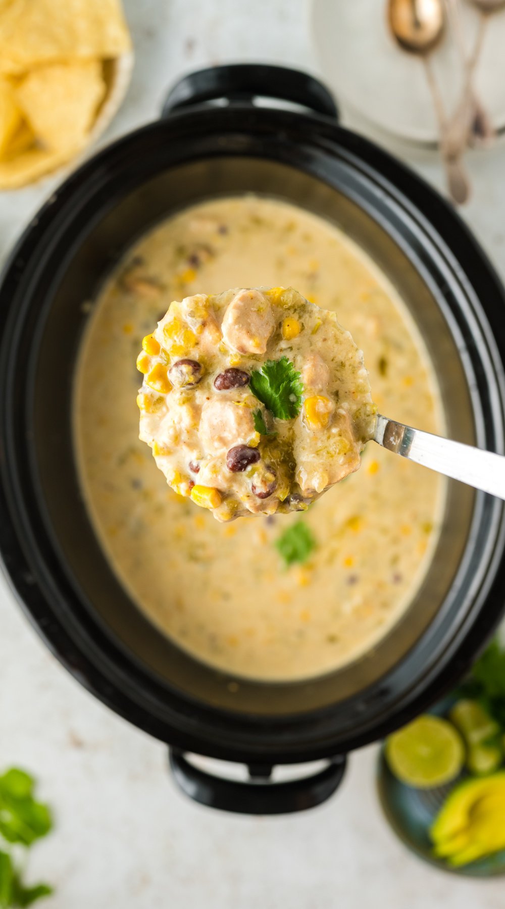 long image of slow cooker green enchilada soup.