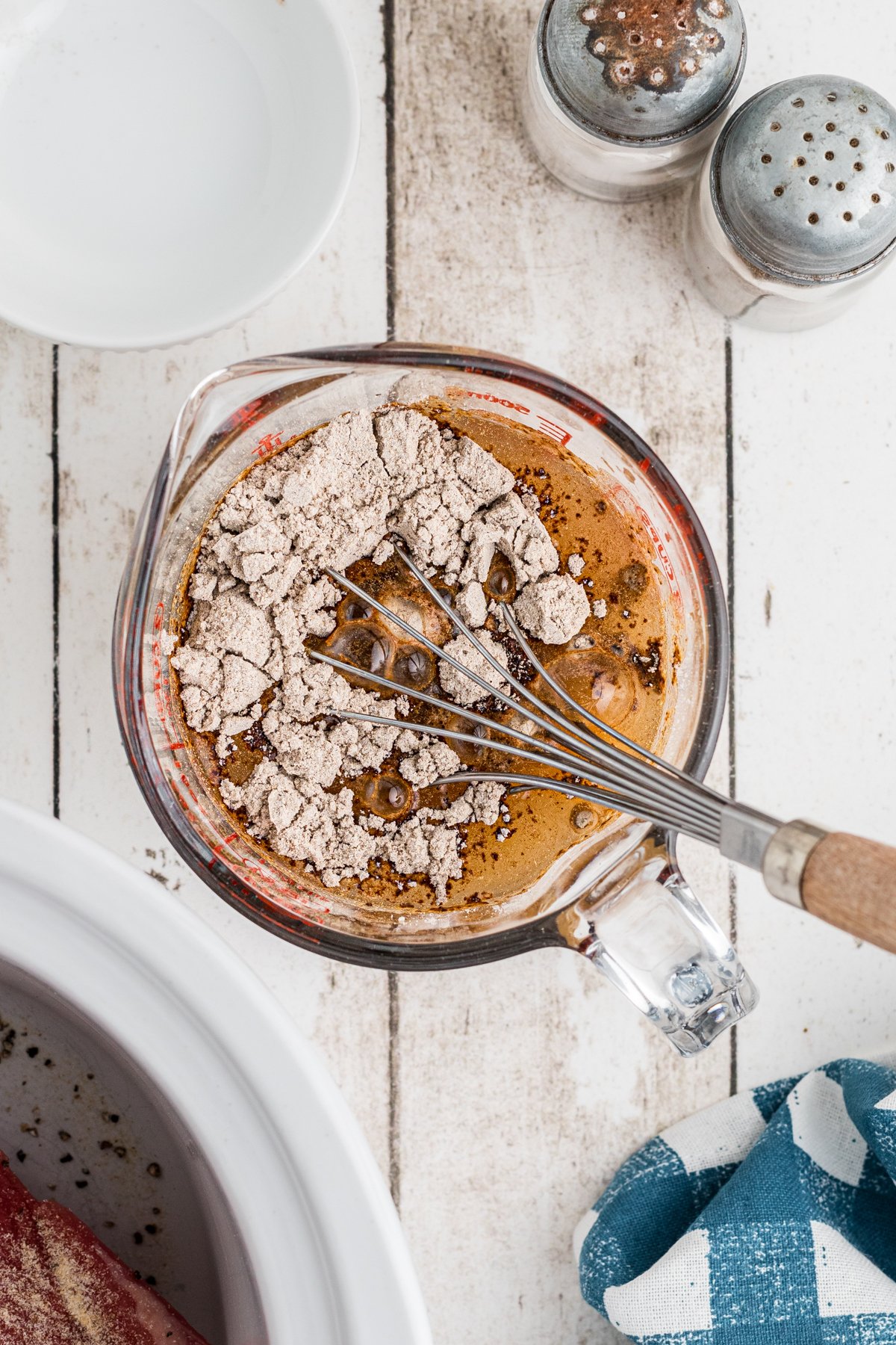 IN a bowl mix together the gravy mix and water together
