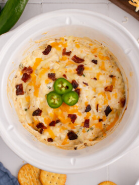 overhead of slow cooker jalapeno popper dip.