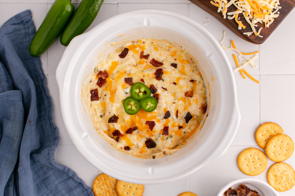 overhead of slow cooker jalapeno popper dip.