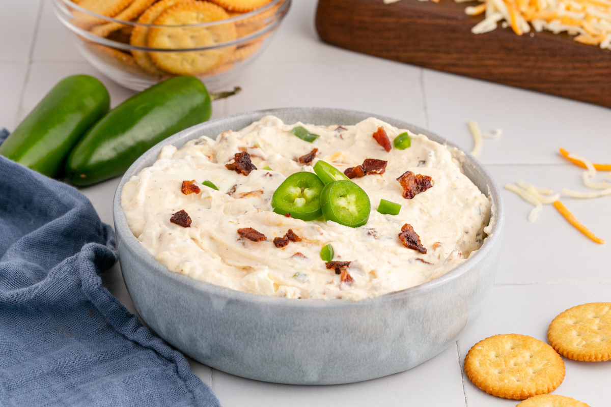 slow cooker jalapeno popper dip in a serving bowl.