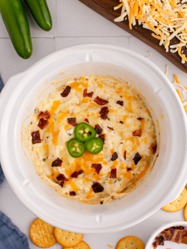 overhead shot of jalapeno popper dip in a slow cooker.