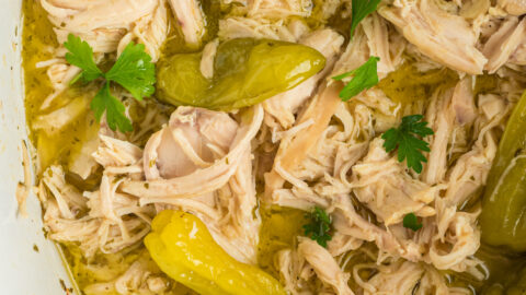 close-up overhead of mississippi chicken in a slow cooker.