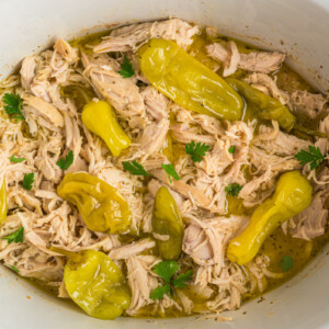 overhead shot of mississippi chicken in a crockpot.