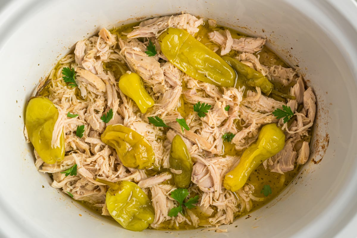 overhead shot of mississippi chicken in a crockpot.