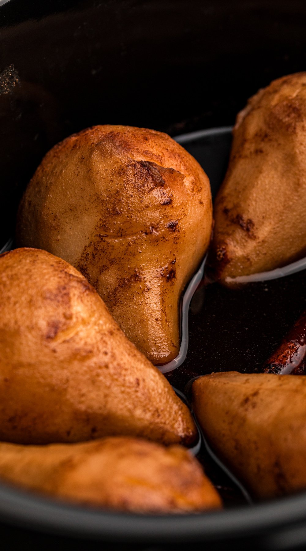 long image of slow cooker poached pears.
