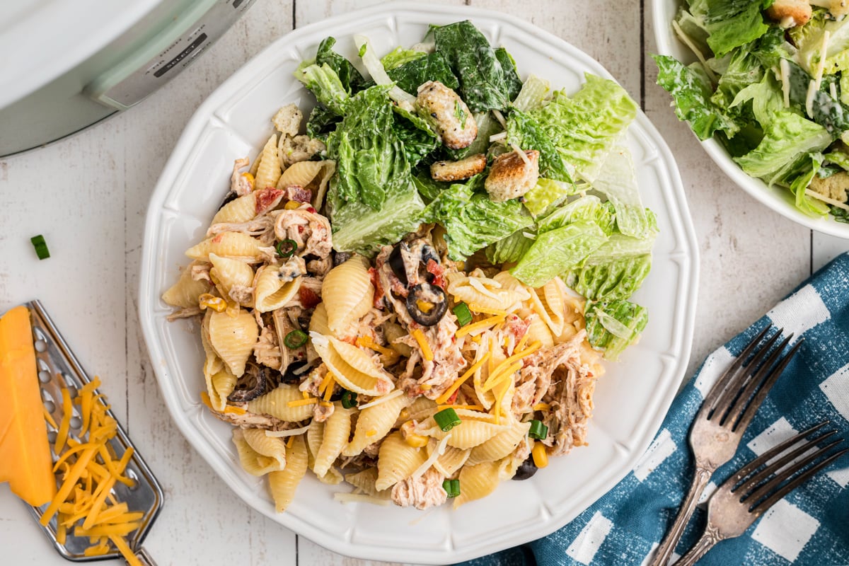 overhead shot of serving of slow cooker southwestern cheesy chicken pasta.