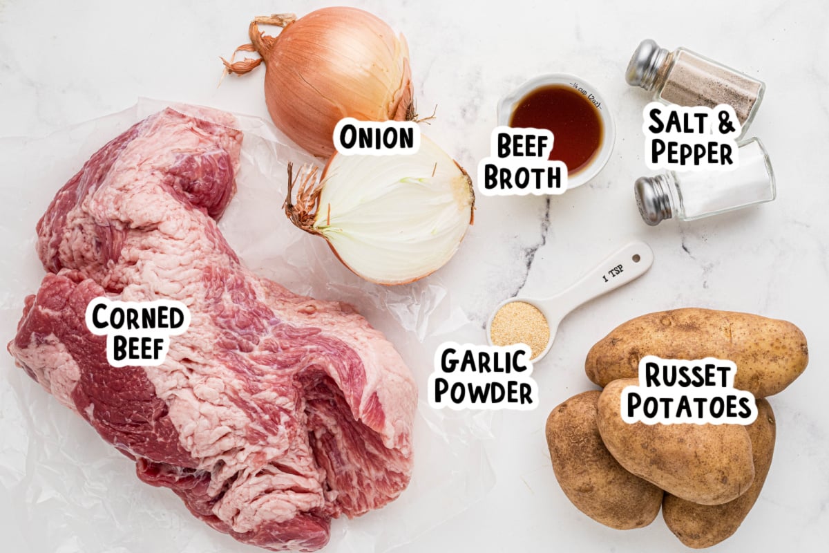 ingredients for corned beef hash on a table.
