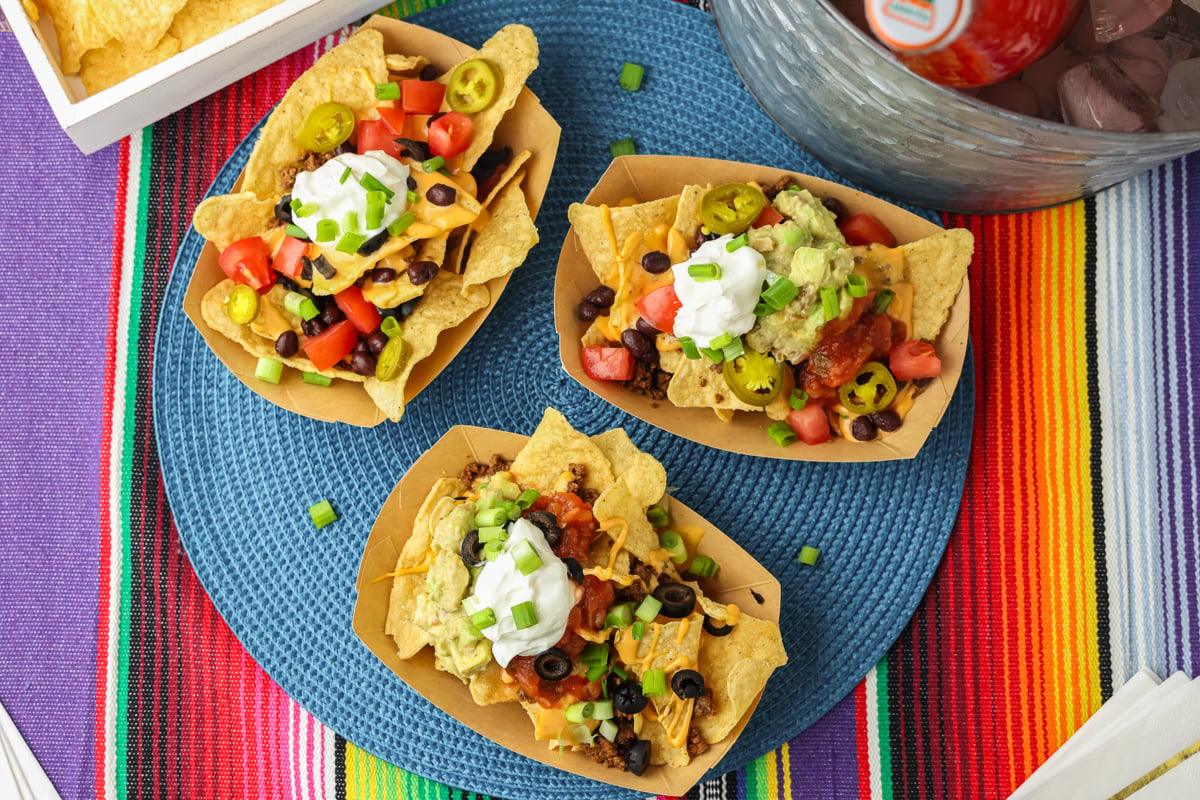 nachos in paper trays.