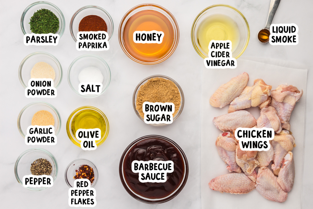 ingredients for slow cooker bbq chicken wings on a table.