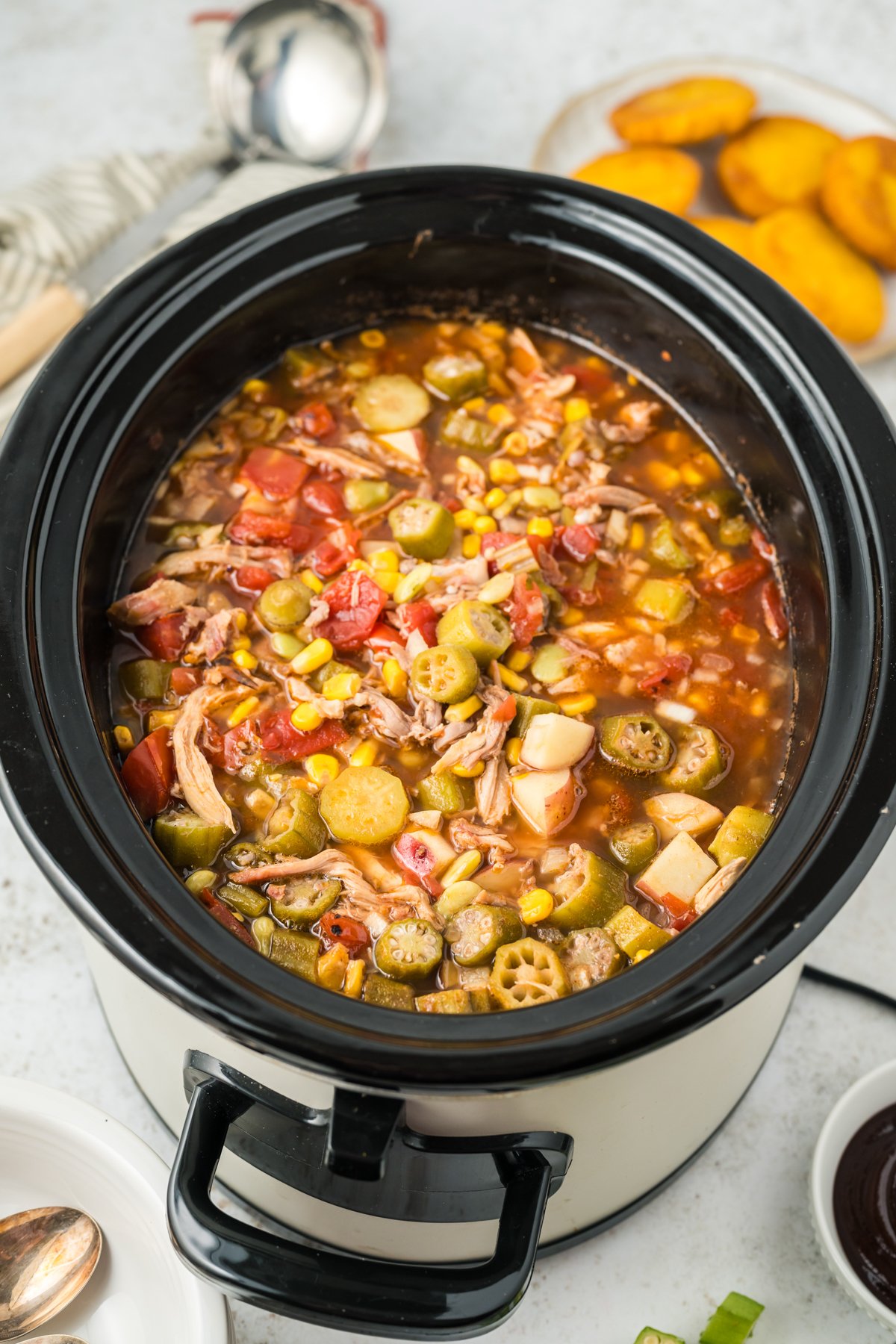 overhead of Brunswick stew in a slow cooker.