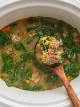 overhead of italian wedding soup in a slow cooker.