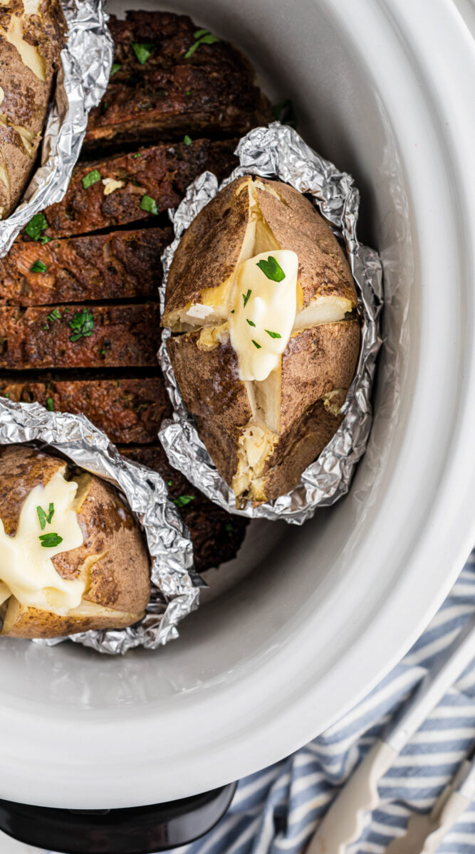 long image of slow cooker meatloaf and baked potatoes.