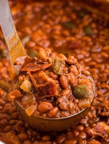 scooping out slow cooker land your man baked beans.