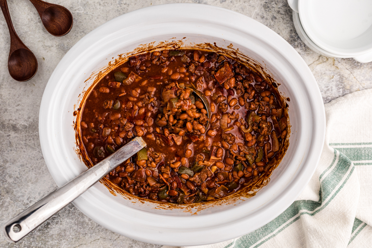 overhead of slow cooker land your man baked beans.