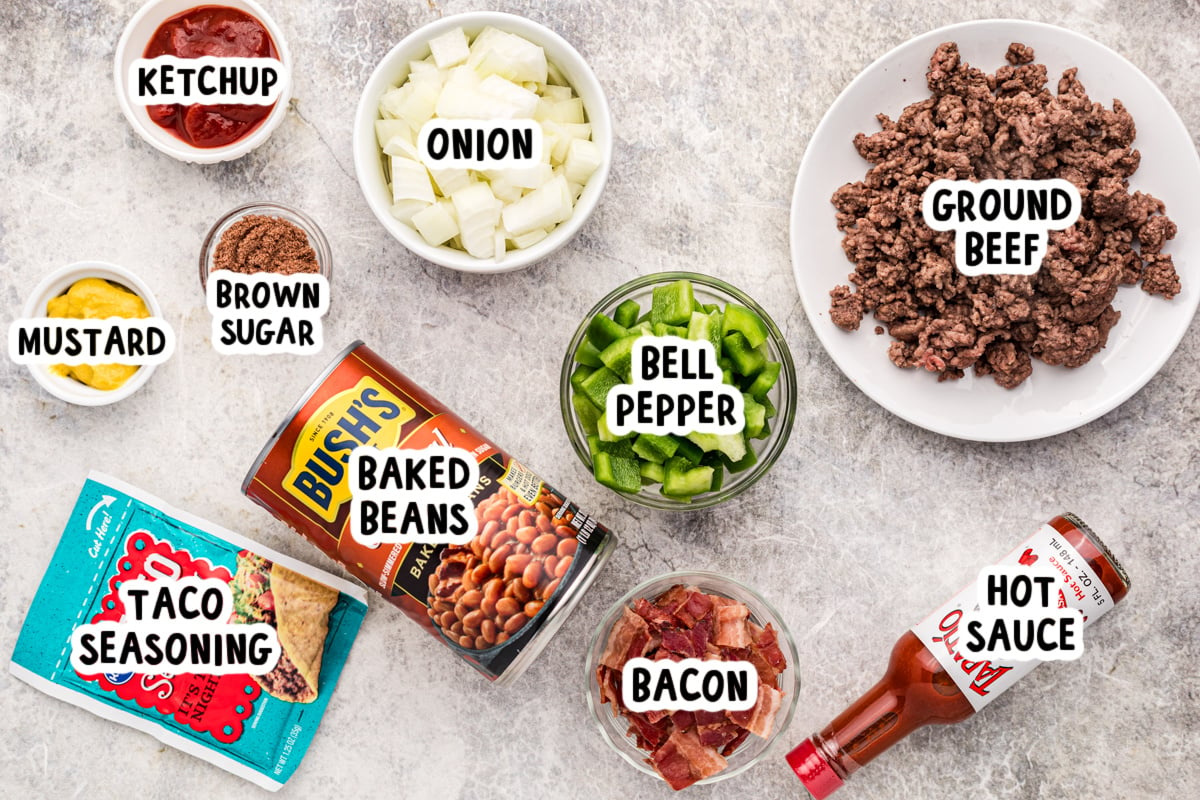 ingredients for slow cooker land your man baked beans on a table.