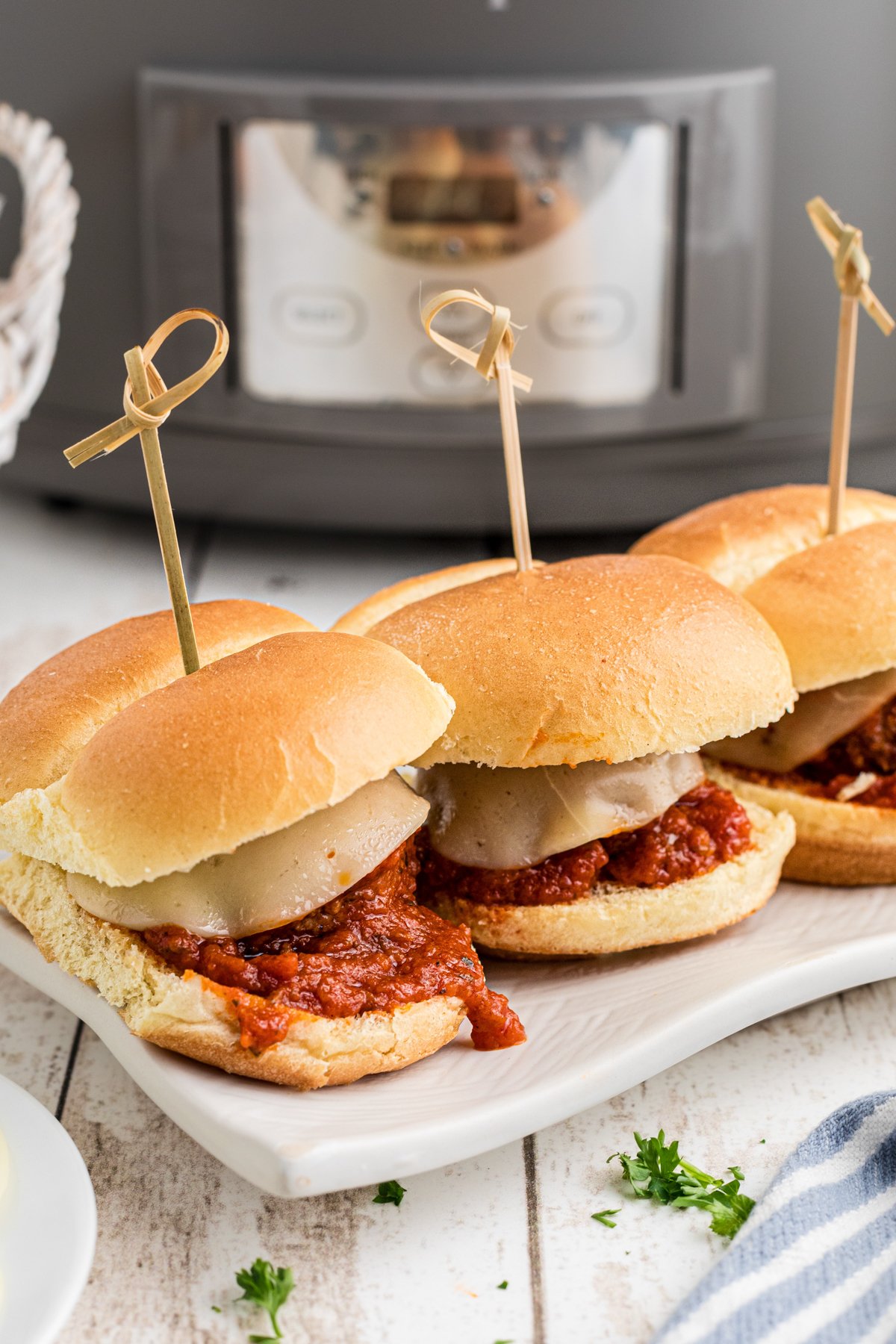 slow cooker meatball sliders on a serving tray.