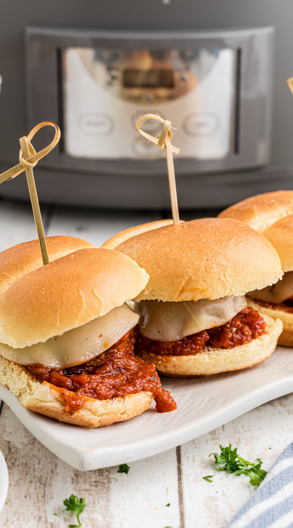 long image of slow cooker meatball sliders.