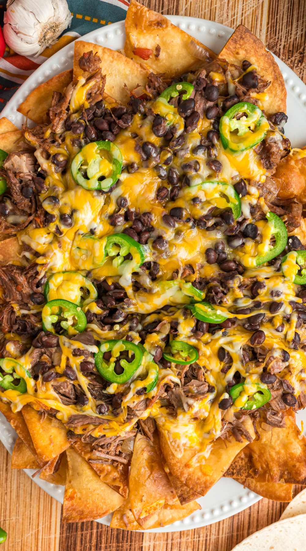 long image of slow cooker pot roast nachos.