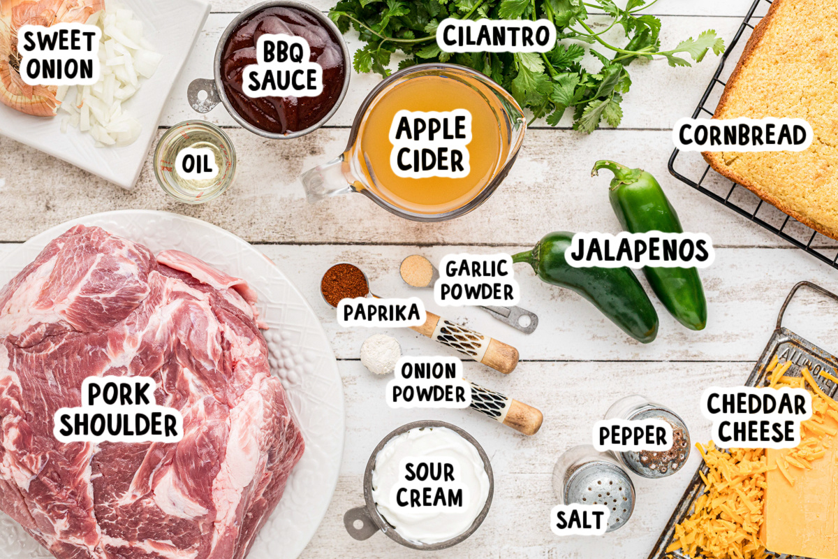 ingredients for slow cooker pulled pork chow down on a table.