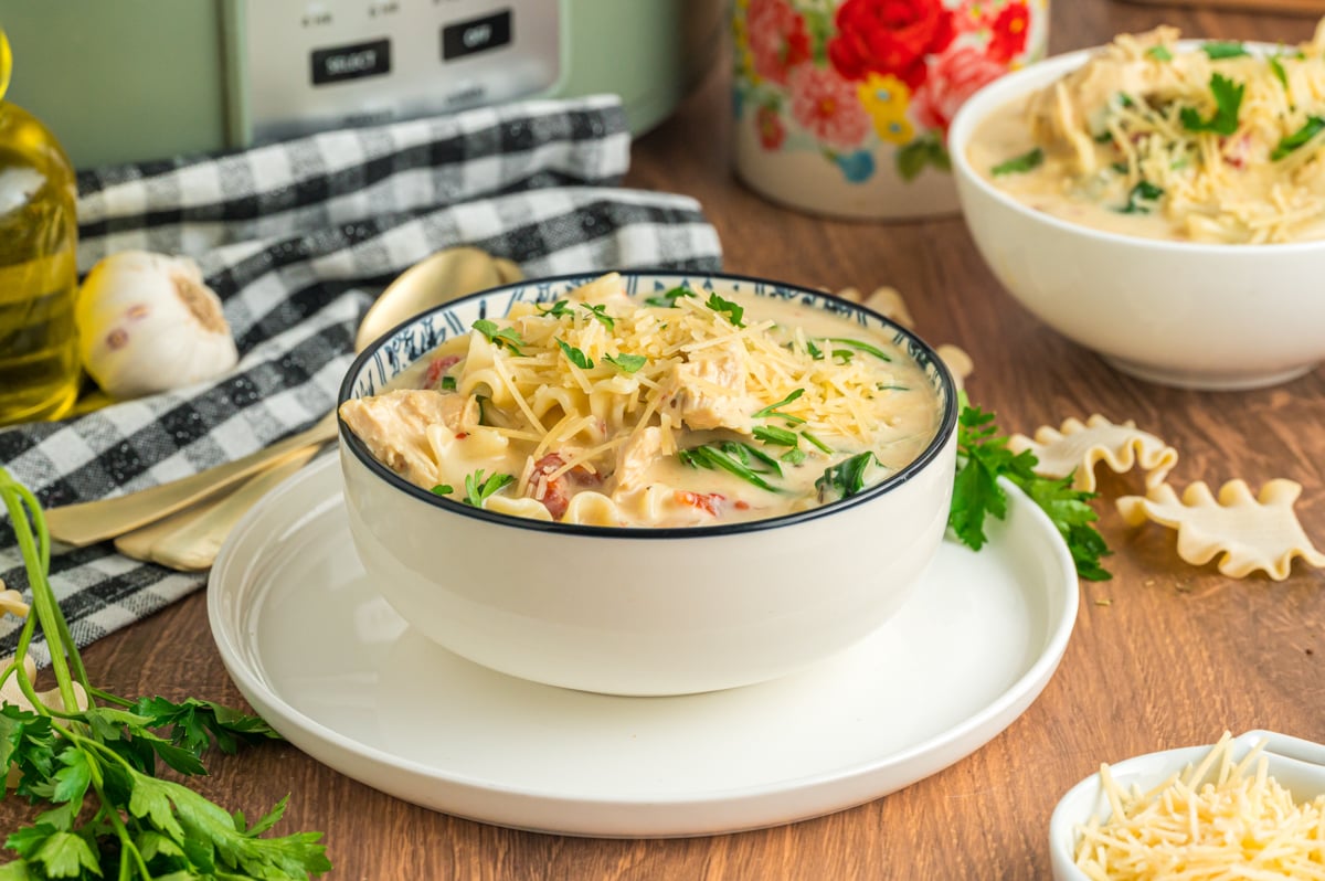serving of slow cooker white lasagna soup in a bowl.