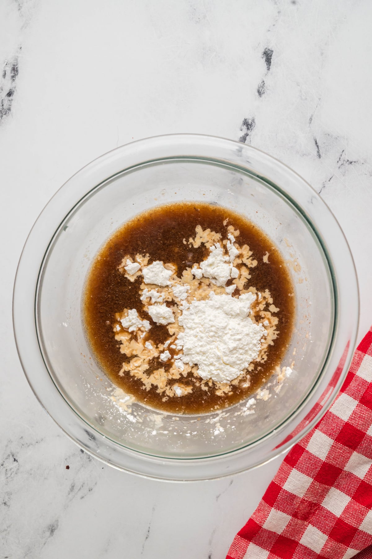 cornstarch and asian sauce in a bowl.