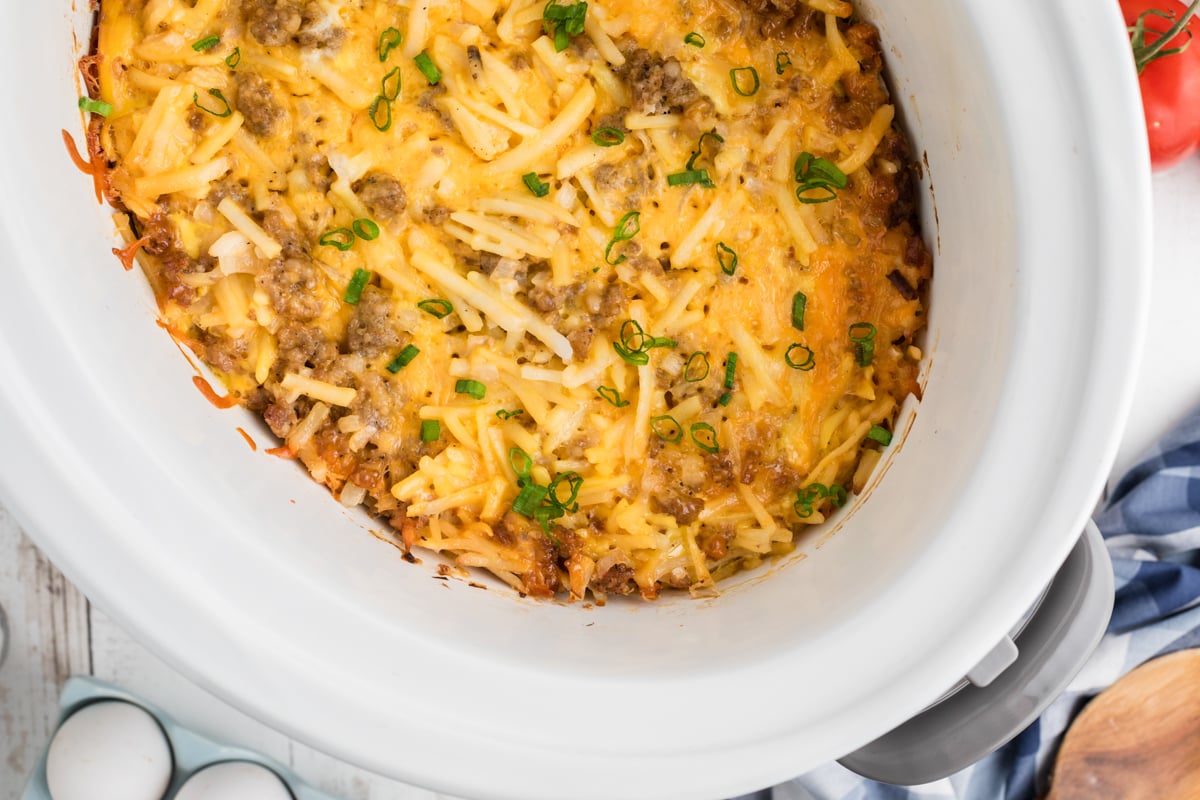 overhead shot of breakfast casserole in a slow cooker.