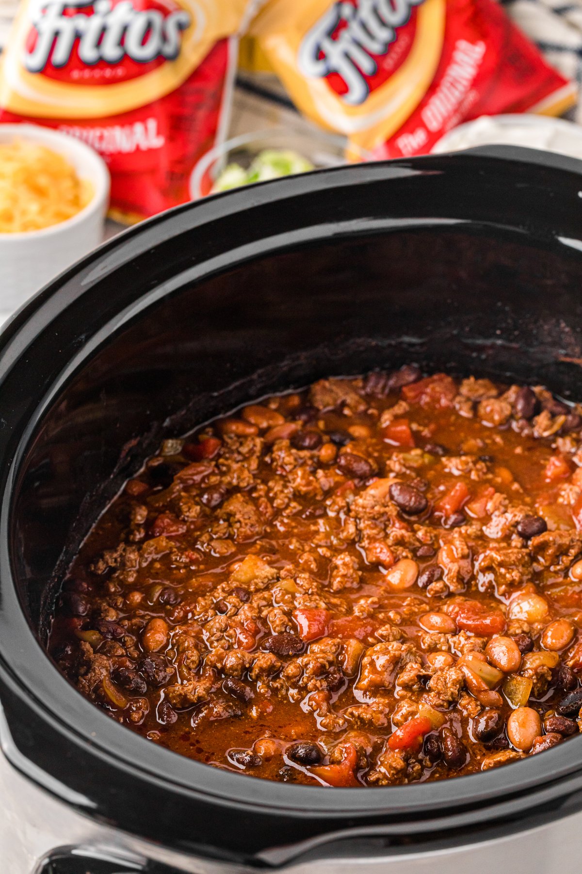 making frito pie in a slow cooker.