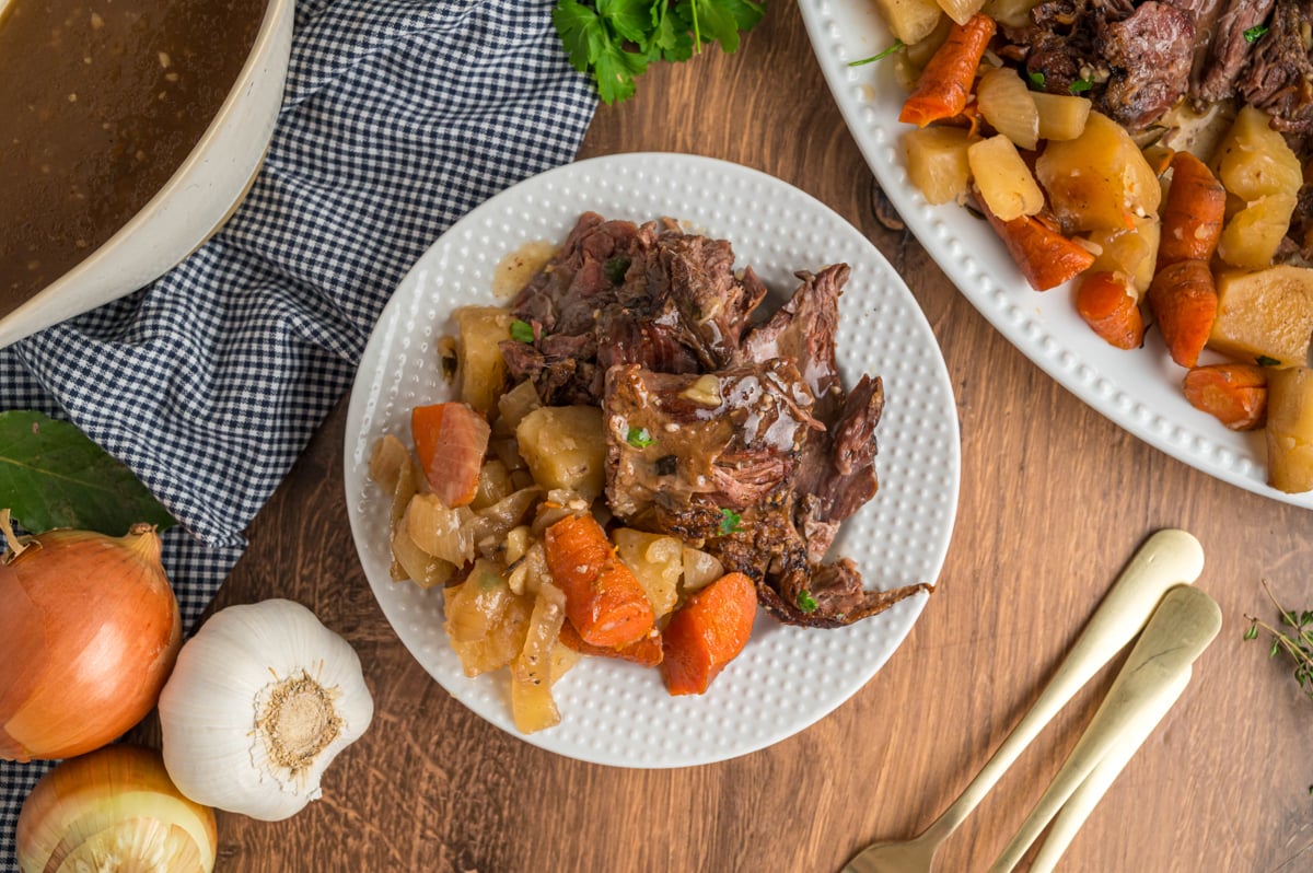overhead shot of serving of slow cooker london broil on a plate.