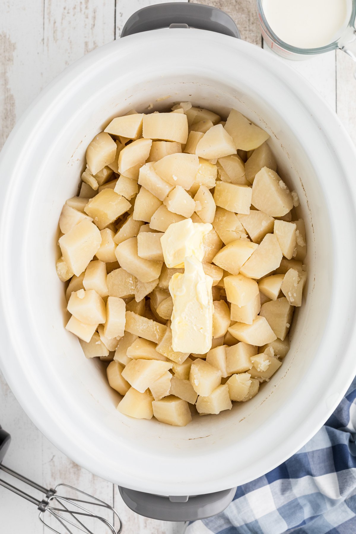butter added to potatoes in slowc cooker.