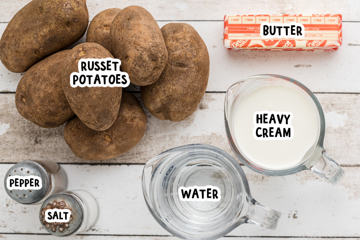 ingredients for slow cooker mashed potatoes on a table.