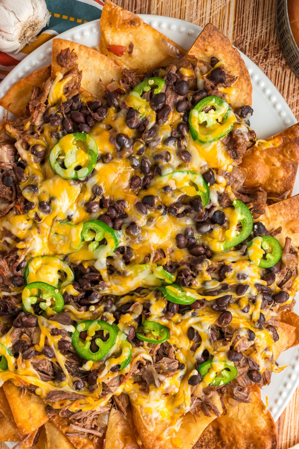 pot roast nachos on a plate.