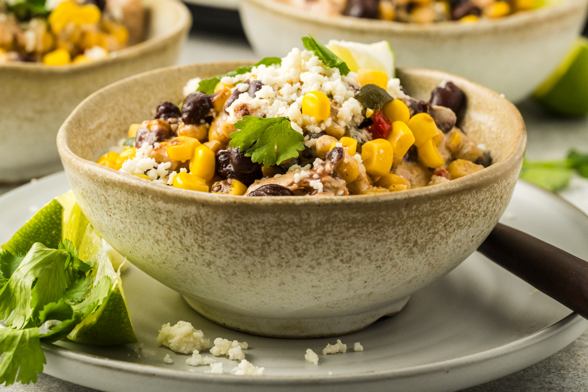 serving of slow cooker street corn chicken in a bowl.