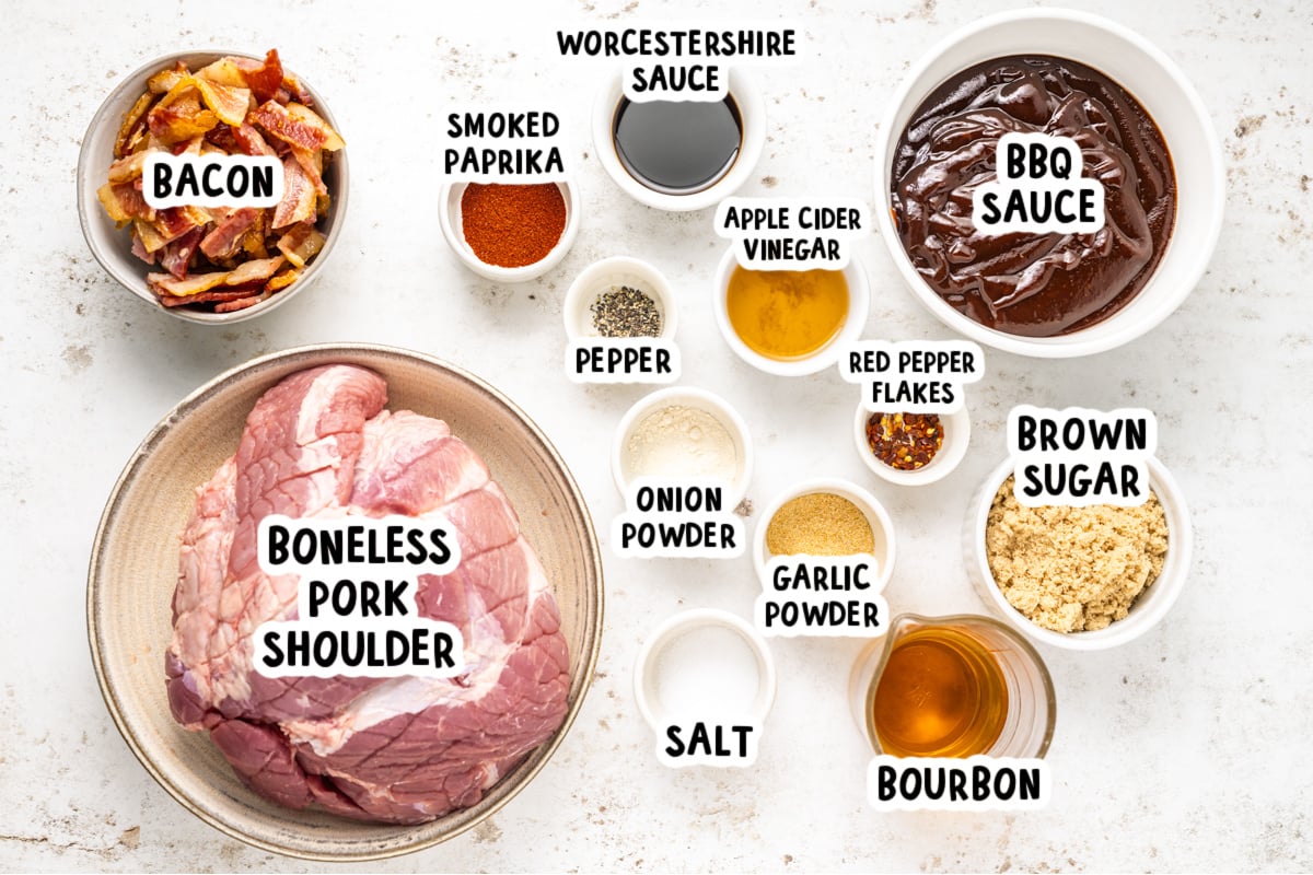 ingredients for slow cooker bourbon bacon pulled pork on a table.