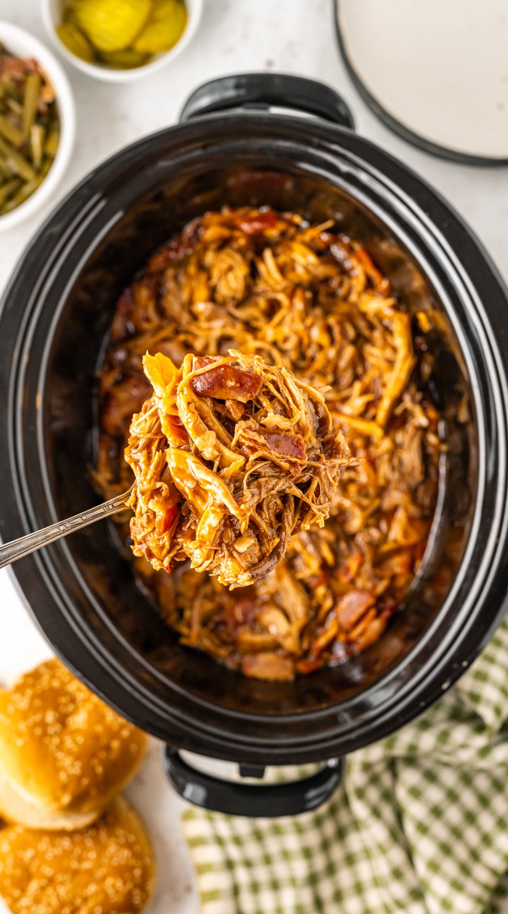 long image of slow cooker bourbon bacon pulled pork.