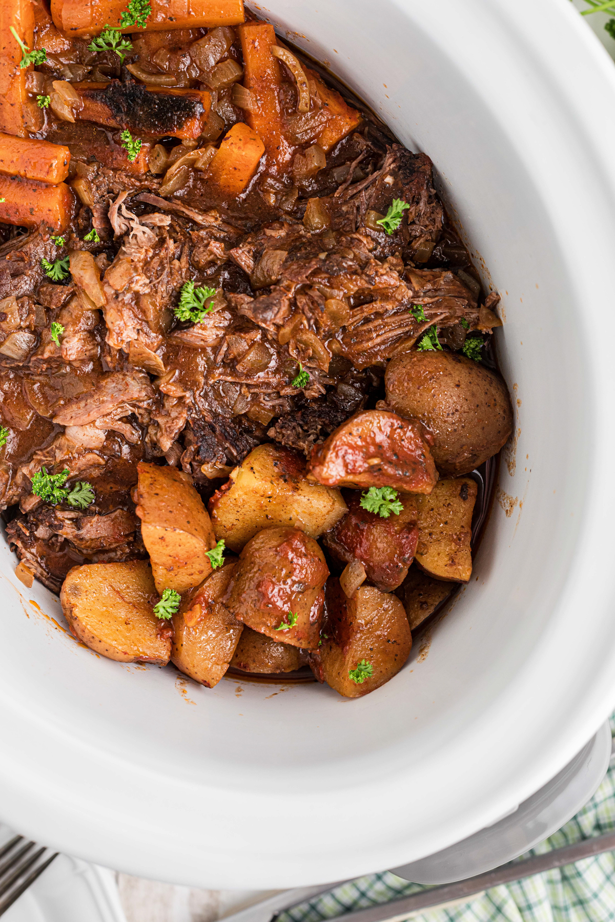overhead shot of italian beef dinner in a slow cooker.