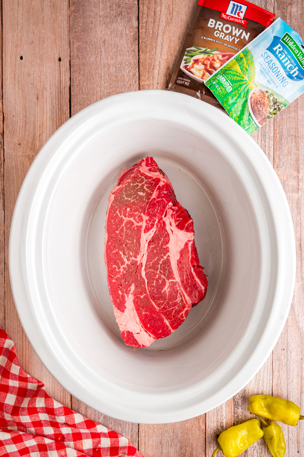 Raw chuck roast in slow cooker