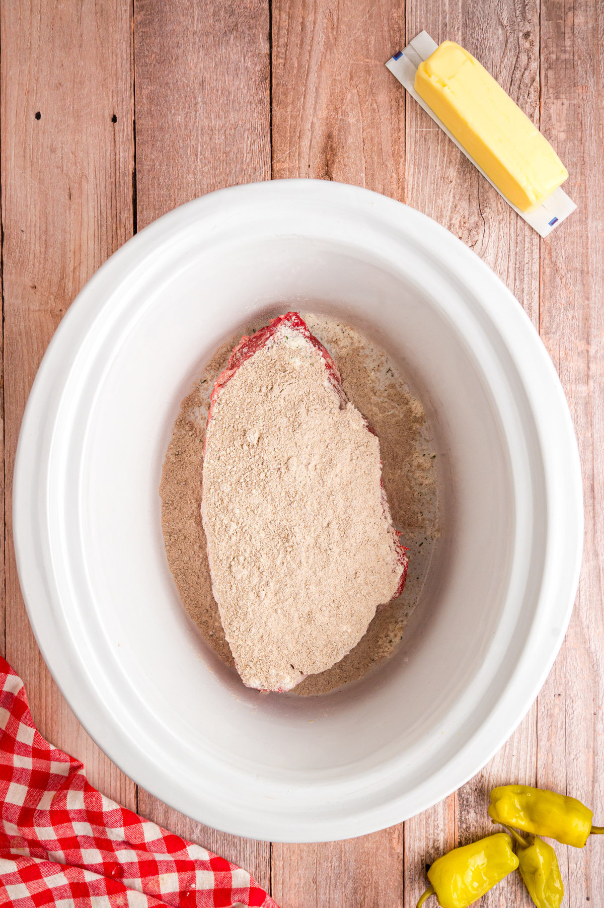 ranch and gravy packet over roast in slow cooker.