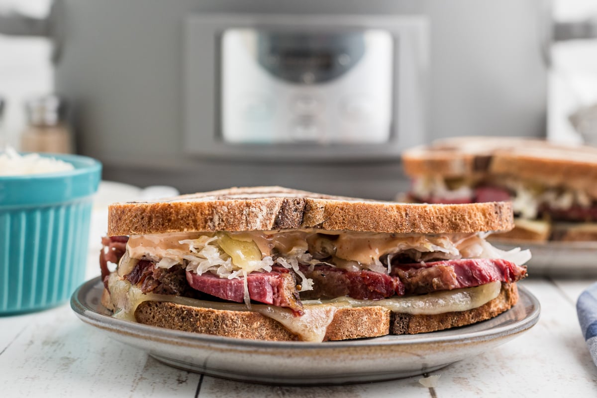 close-up of slow cooker pastrami sandwich.