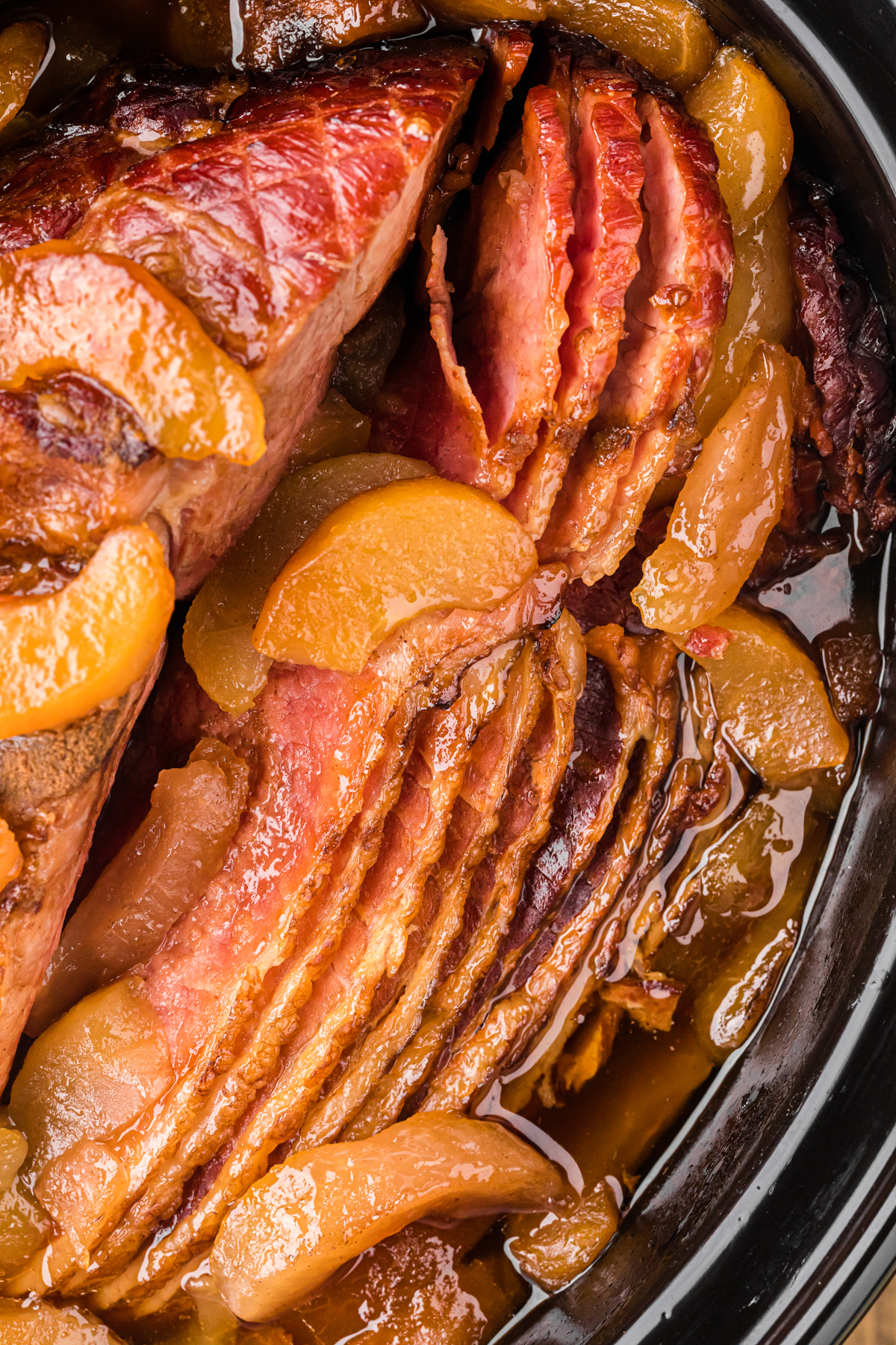 close-up of slow cooker apple and clove ham.